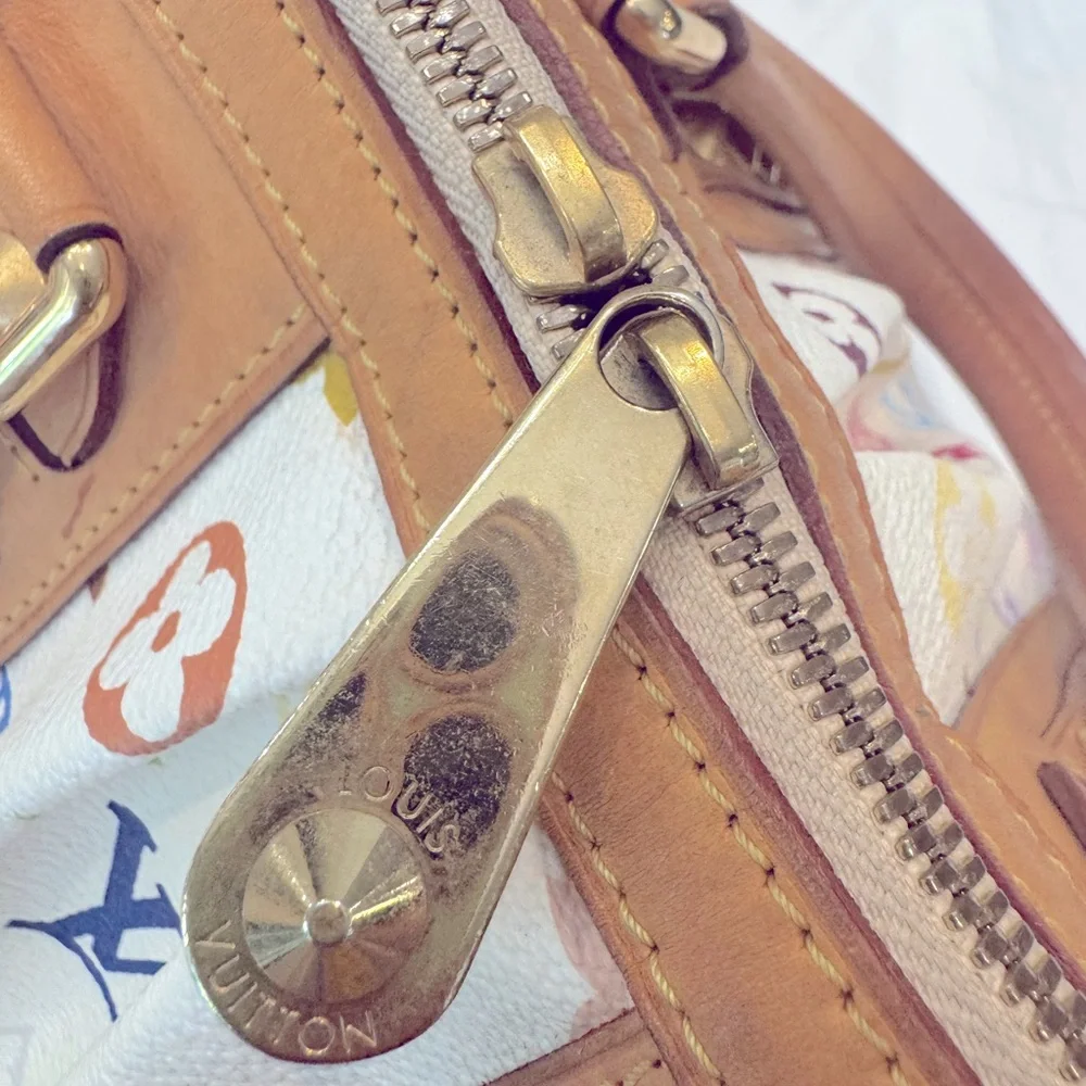Authentic Louis Vuitton White Multicolor Courtney MM bag
